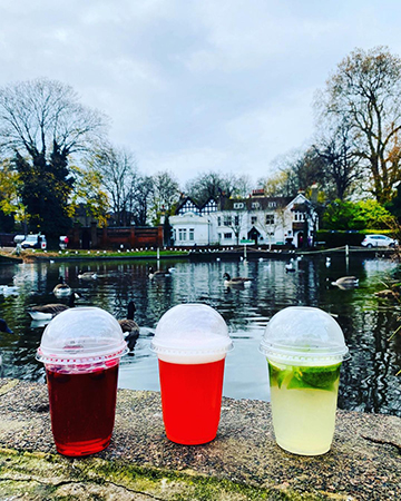 cocktails plastics by a stream